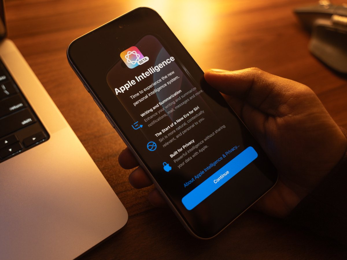 A hand holding an iPhone with an