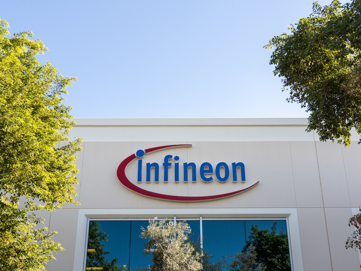 The blue and red Infineon logo against a white building.