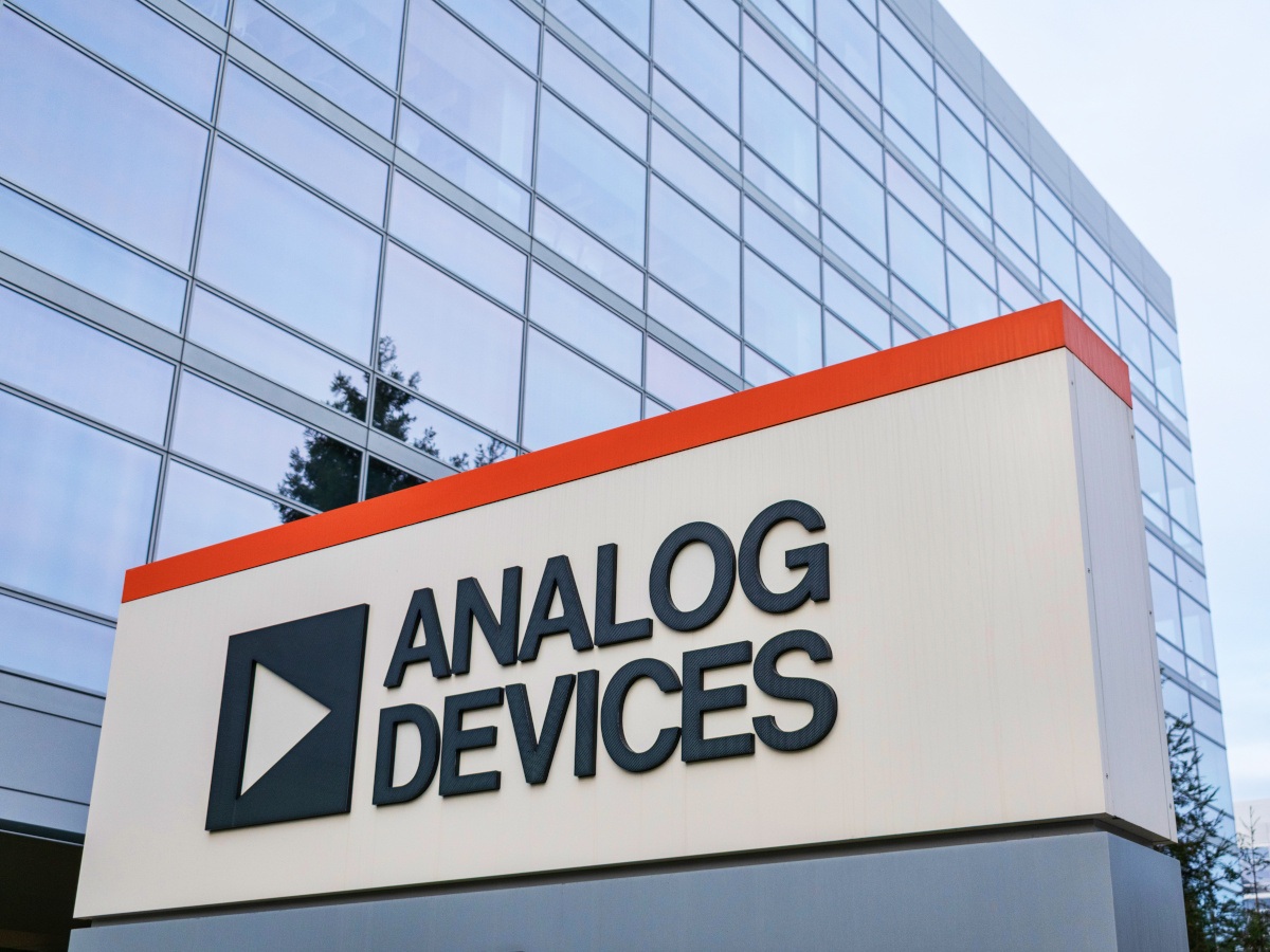 Analog Devices logo and sign in front of a corporate building.