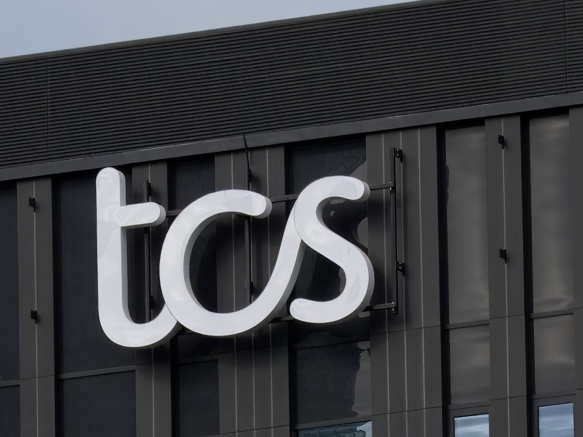 Close up of the TCS logo on the top of office in Warsaw