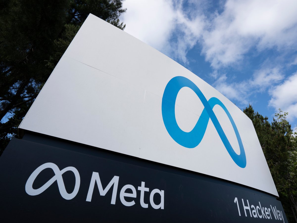 A large Meta logo outside the company building in Menlo Park.