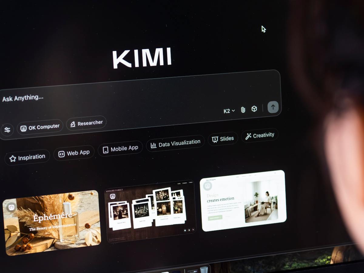 A person using the Kimi AI chatbot on a computer.