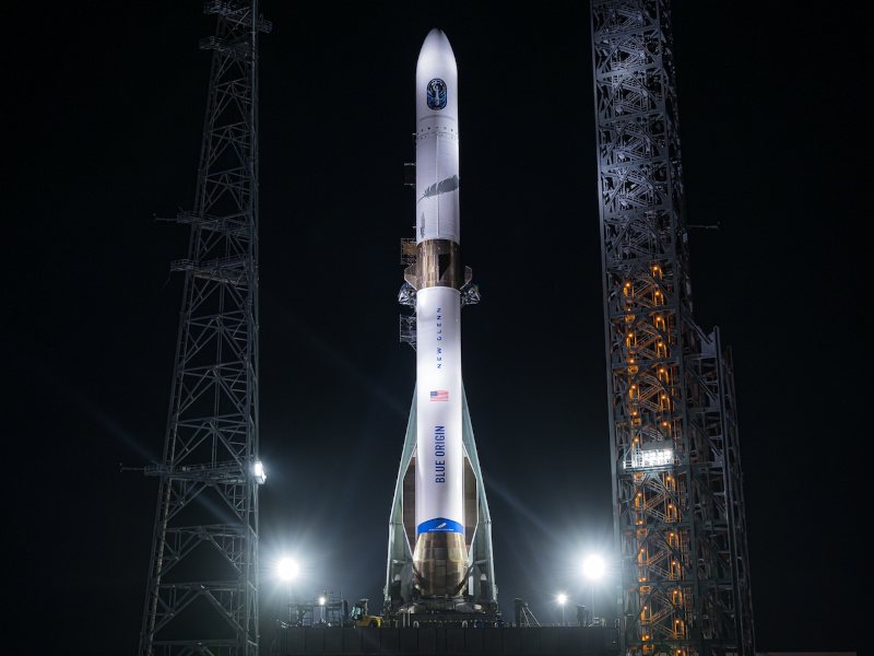 Blue Origin’s large New Glenn rocket seen on a launchpad. The image was taken during nightfall.