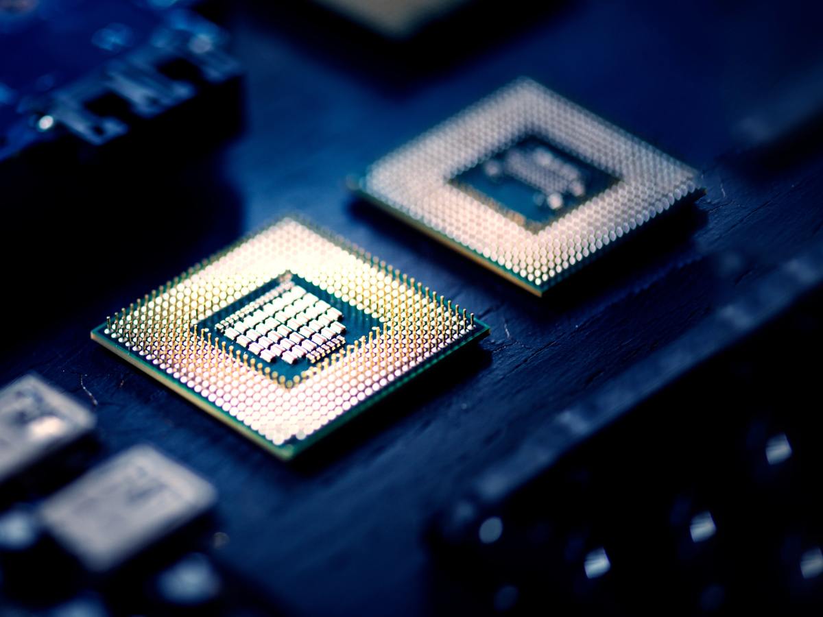 A blue board and shiny computer chips