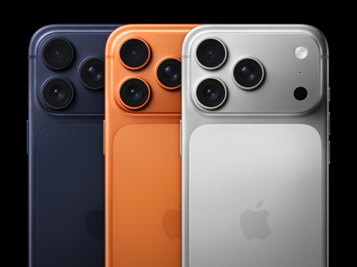A black background and three iPhones displayed with their camera side facing front.