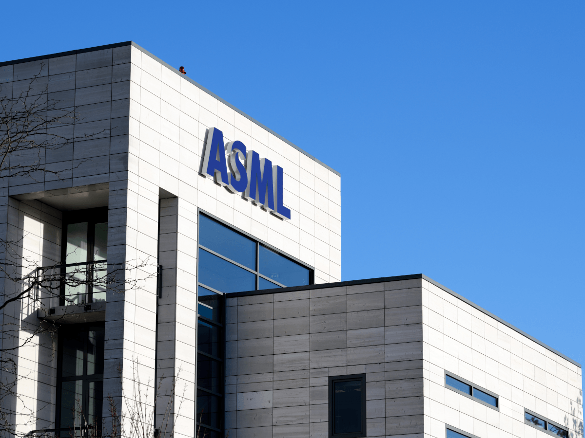 A building with a bright blue sky in the back. The Angular building has an ASML logo on top.