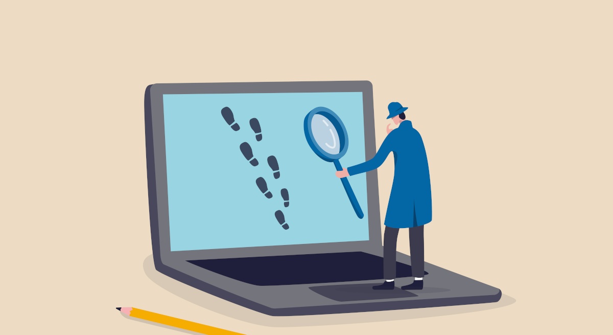 A cartoon image of a man standing on a laptop holding a magnifying glass tracking footprints across the screen.